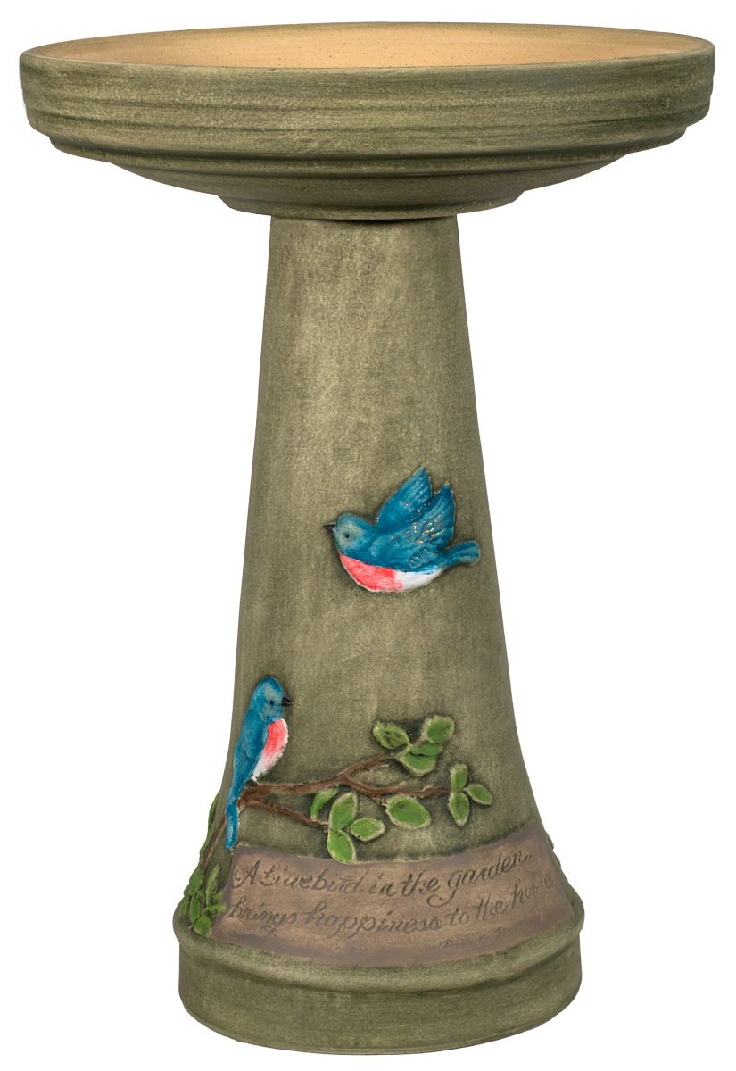 Decorative bird bath with bird designs on a white background