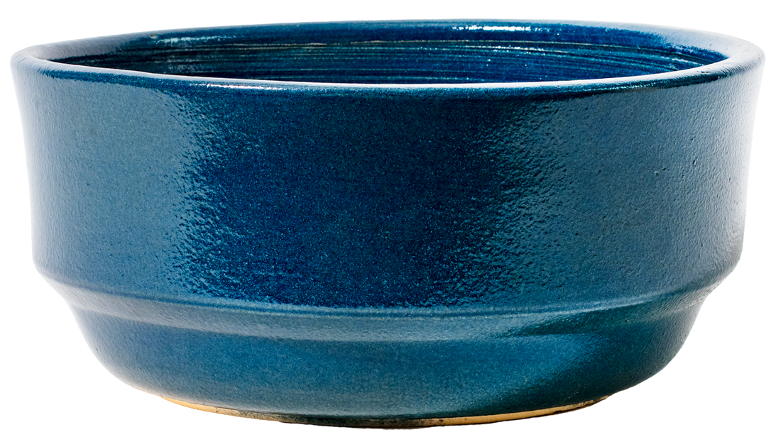 large rounded bowl planter in blue glaze