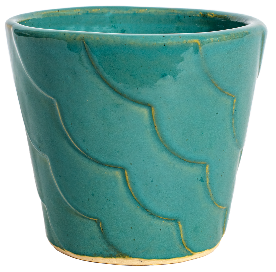 small turquoise ceramic planter with ribbon design