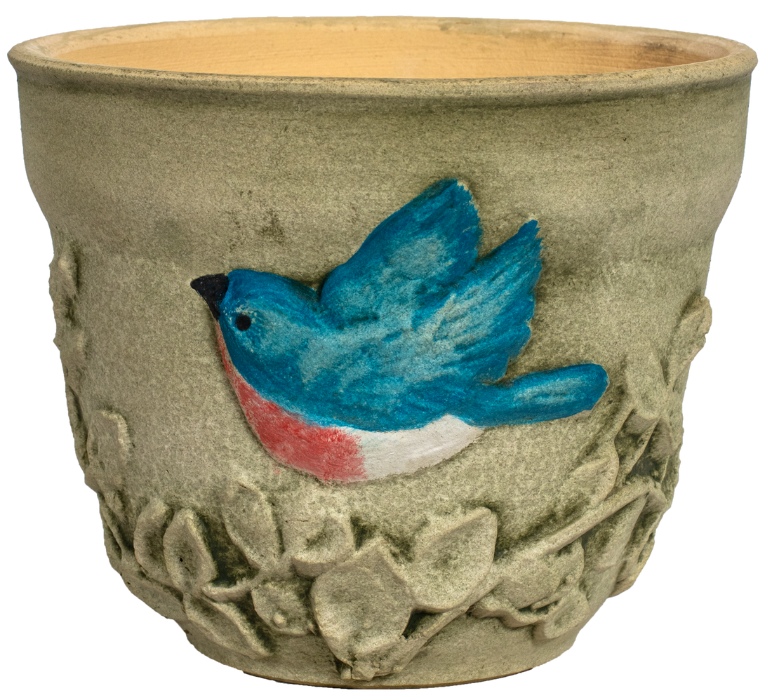 small planter with a hand painted bluebird and leafs