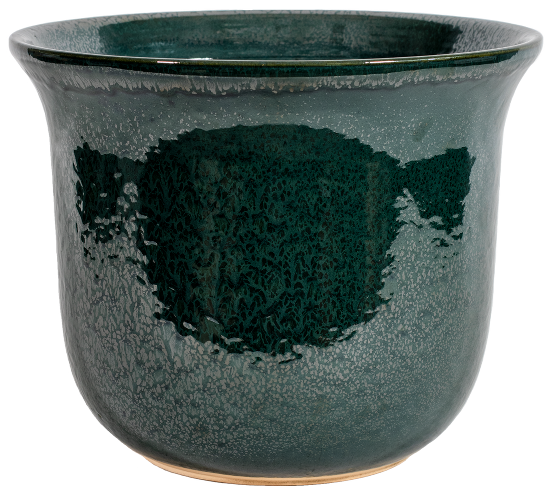 large ceramic green planter in a bell shape