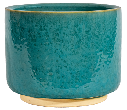 medium turquoise ceramic cylinder planter in a modern style with small pedestal foot