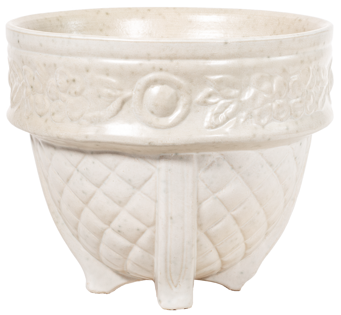 large ceramic white planter with quilted pattern and flower design