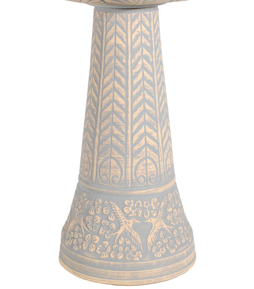 ceramic tan and light blue birdbath pedestal with birds flowers and a chevron design