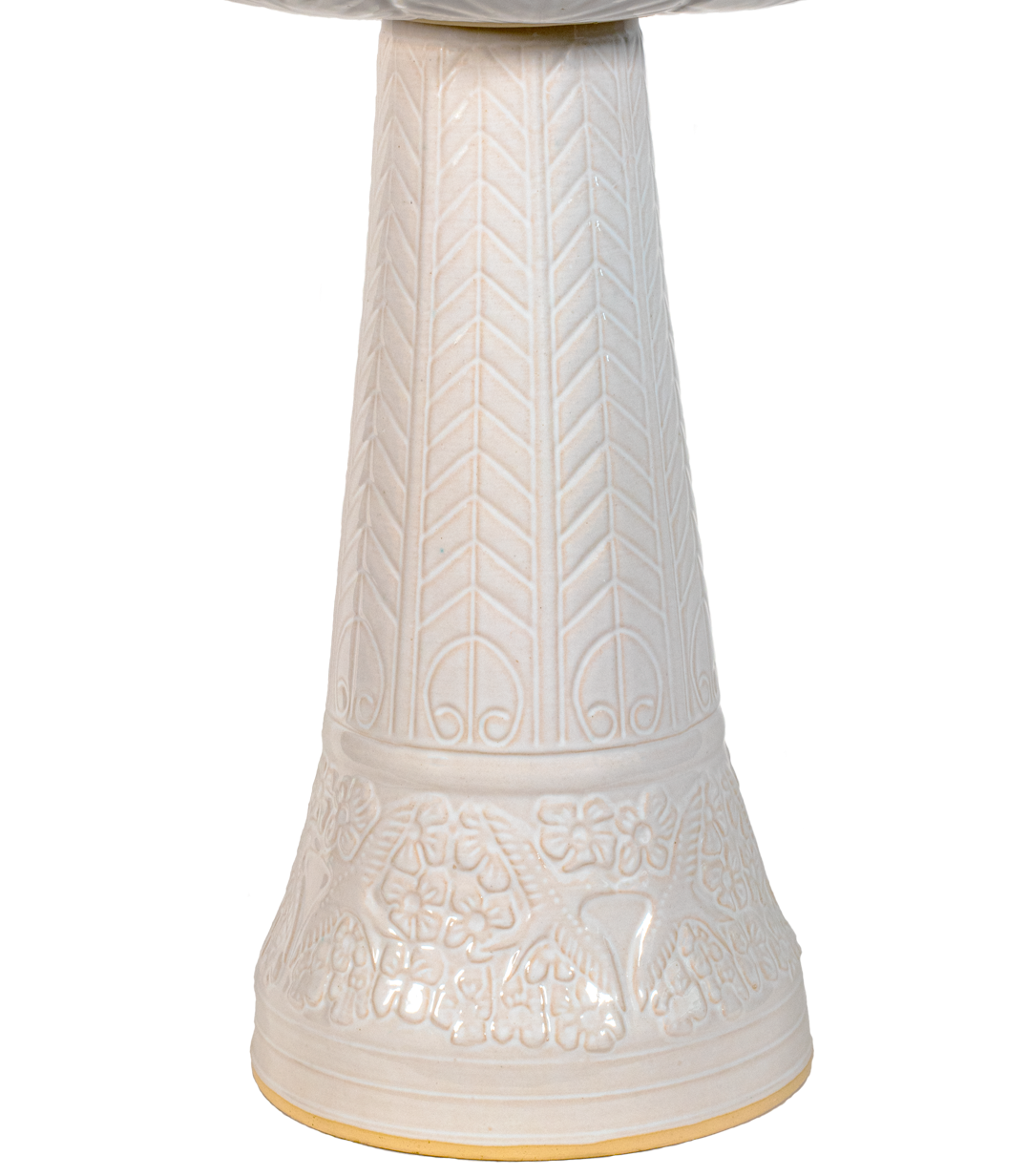 ceramic white birdbath pedestal with birds flowers and a chevron design