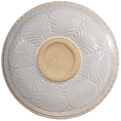 Ceramic white birdbath top with large leaf pattern view of back