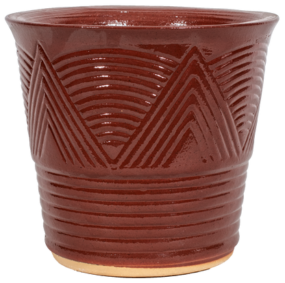 American Made indoor ceramic planter. Art deco style design in a unique multi color glaze. Purple and brown tones and other times blush or pink toned