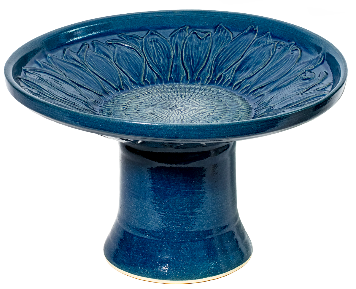 short ceramic sunflower birdbath set in blue glaze