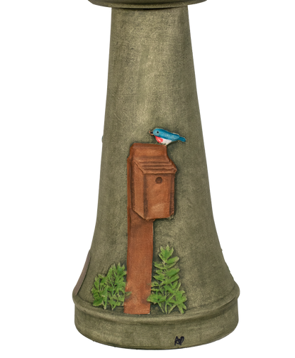 Decorative bird bath with mailbox and bird design on a white background