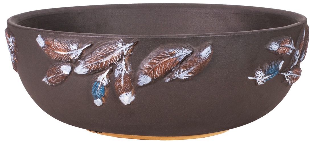 large shallow brown planter bowl with hand painted feather design