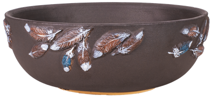 large shallow brown planter bowl with hand painted feather design