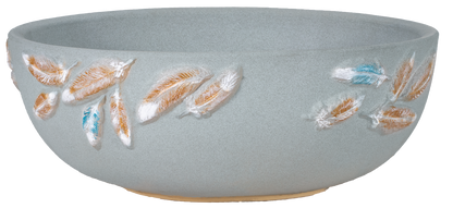 large shallow light blue planter bowl with hand painted feather design