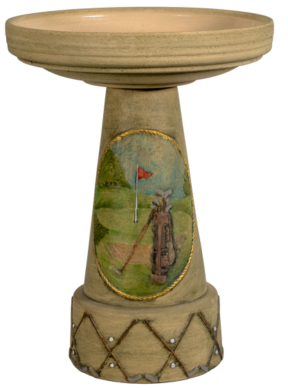 Decorative bird bath with golf-themed design on a white background