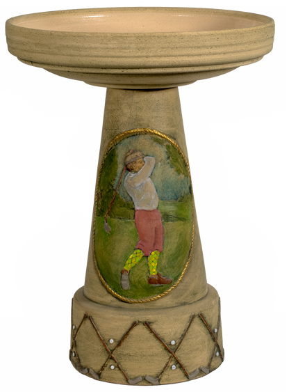 Decorative bird bath with a golf-themed design on a white background