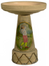 Decorative bird bath with a golf-themed design on a white background