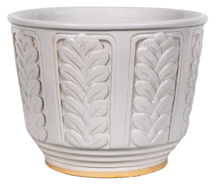 A light gray glazed ceramic planter pot with a textured vertical leaf pattern and a natural tan clay base, shown against a plain white background.