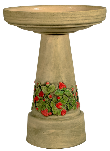 Decorative bird bath with strawberry patch design on a white background