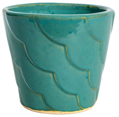 small turquoise ceramic planter with ribbon design