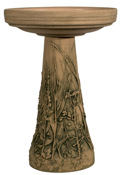 Decorative bird bath with naturalistic flower and grasses design on a white background