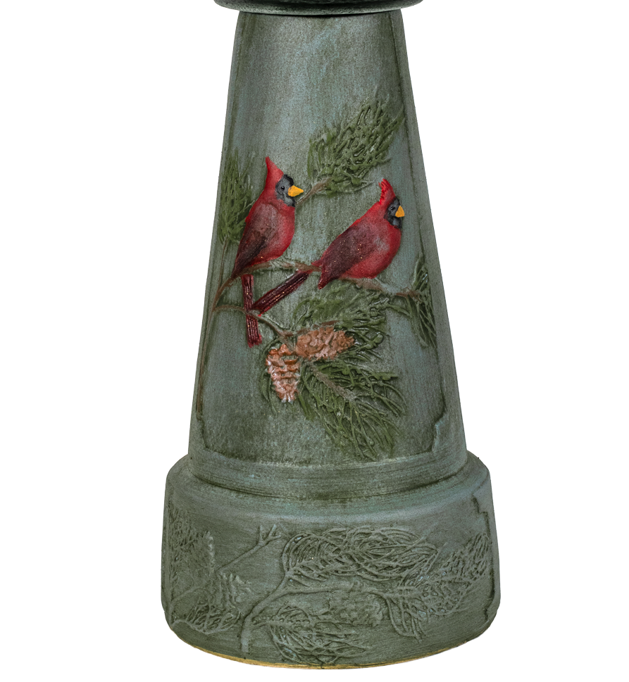 Decorative bird bath with cardinals and nature design on a white background