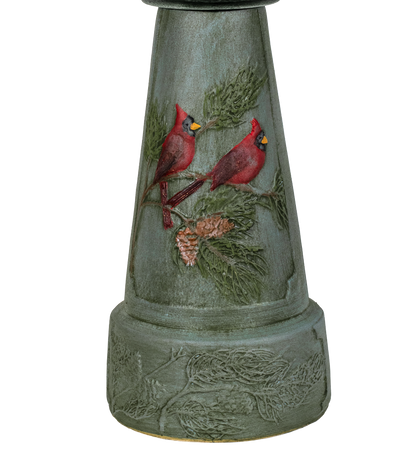 Decorative bird bath with cardinals and nature design on a white background