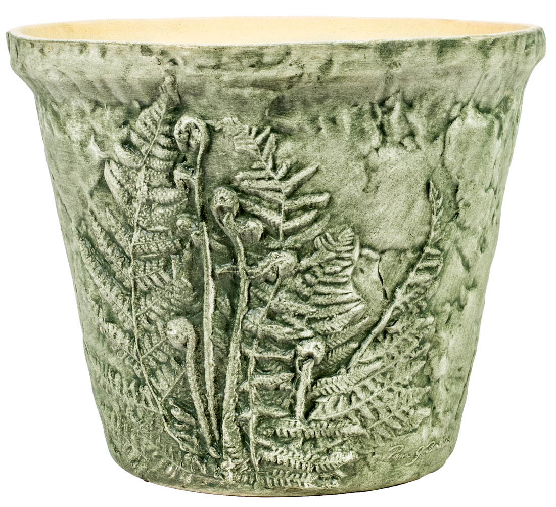 large green aged ceramic planter with ferns embedded