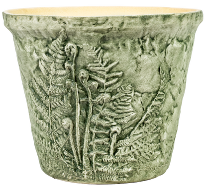 large green aged ceramic planter with ferns embedded 