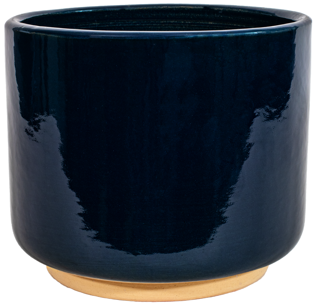 medium Blue ceramic cylinder planter in a modern style with small pedestal foot