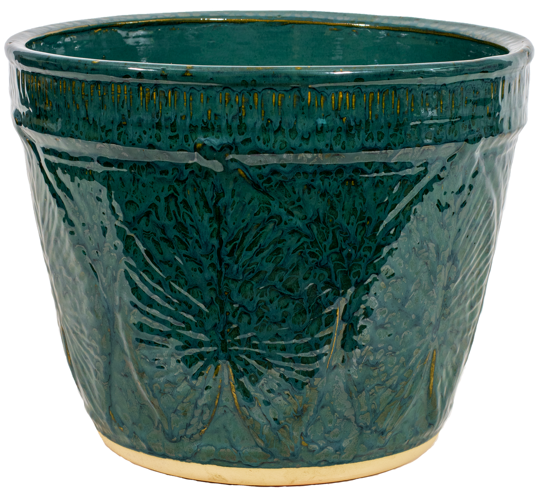 Large outdoor patio planter in green glaze with leaf design