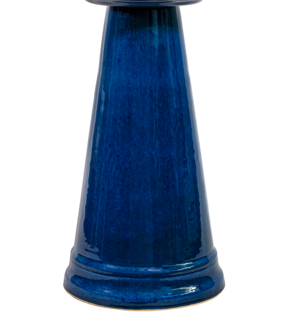 ceramic blue birdbath pedestal with a simple modern design