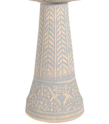 ceramic tan and light blue birdbath pedestal with birds flowers and a chevron design