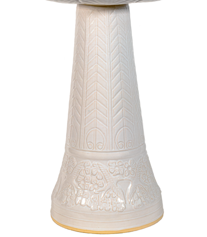 ceramic white birdbath pedestal with birds flowers and a chevron design