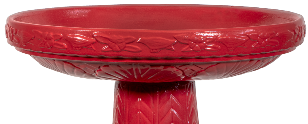 ceramic red birdbath top with large leaf pattern and birds