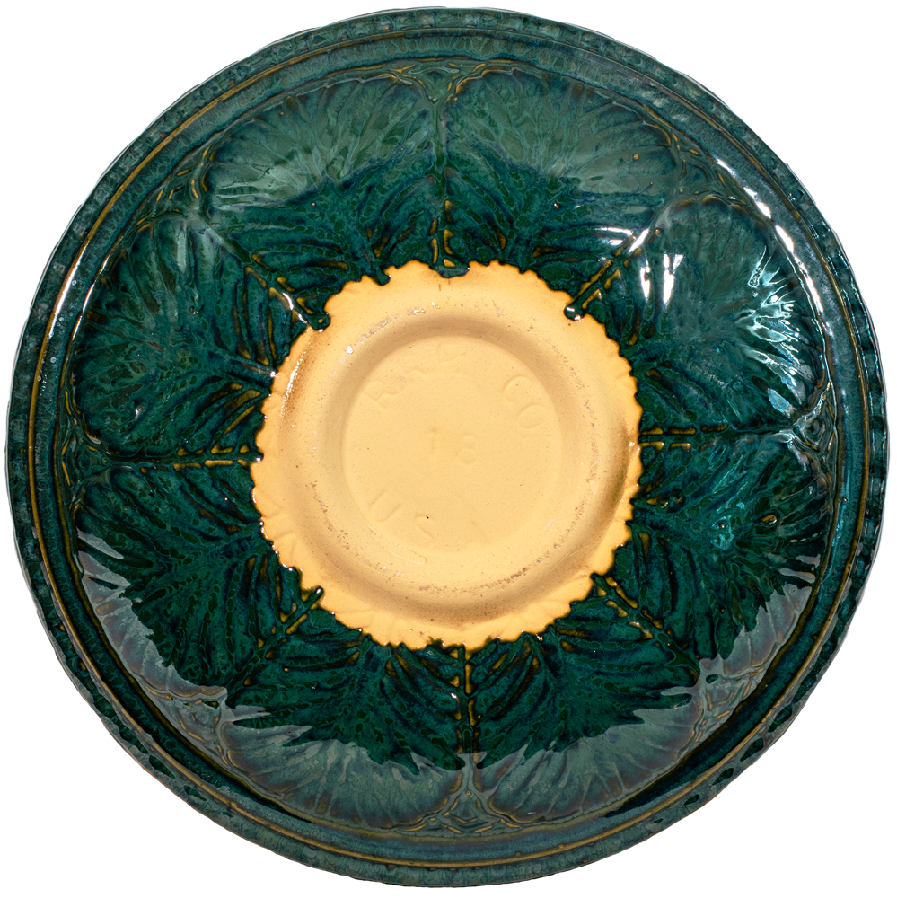 Ceramic green birdbath top with large leaf pattern view of back