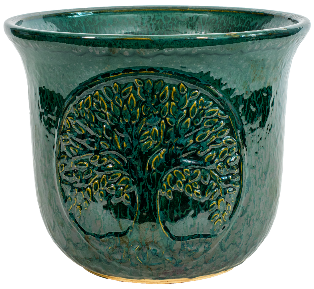 large green rounded ceramic planter with a Tree of Life Motif