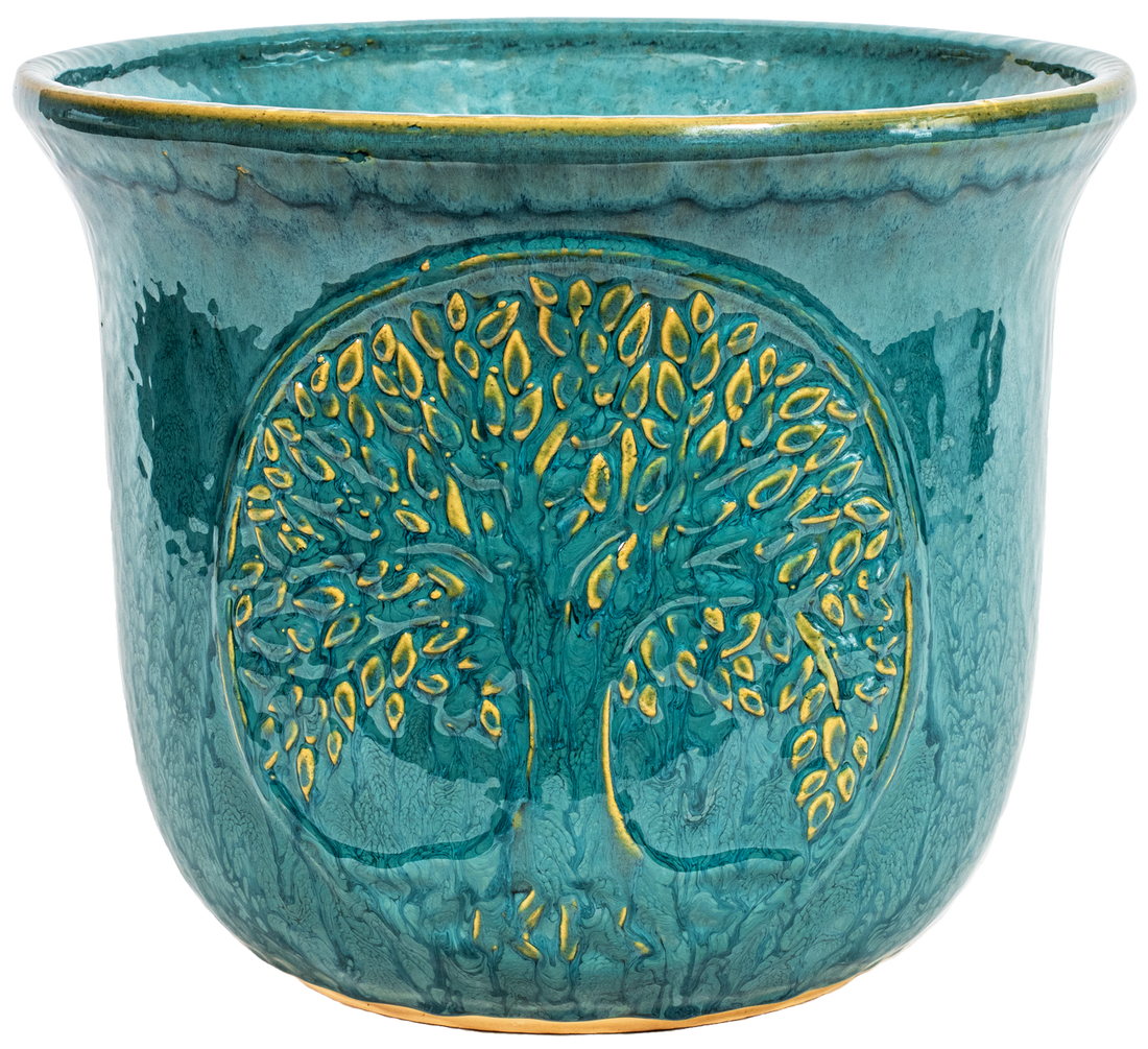 large turquoise rounded ceramic planter with a Tree of Life Motif